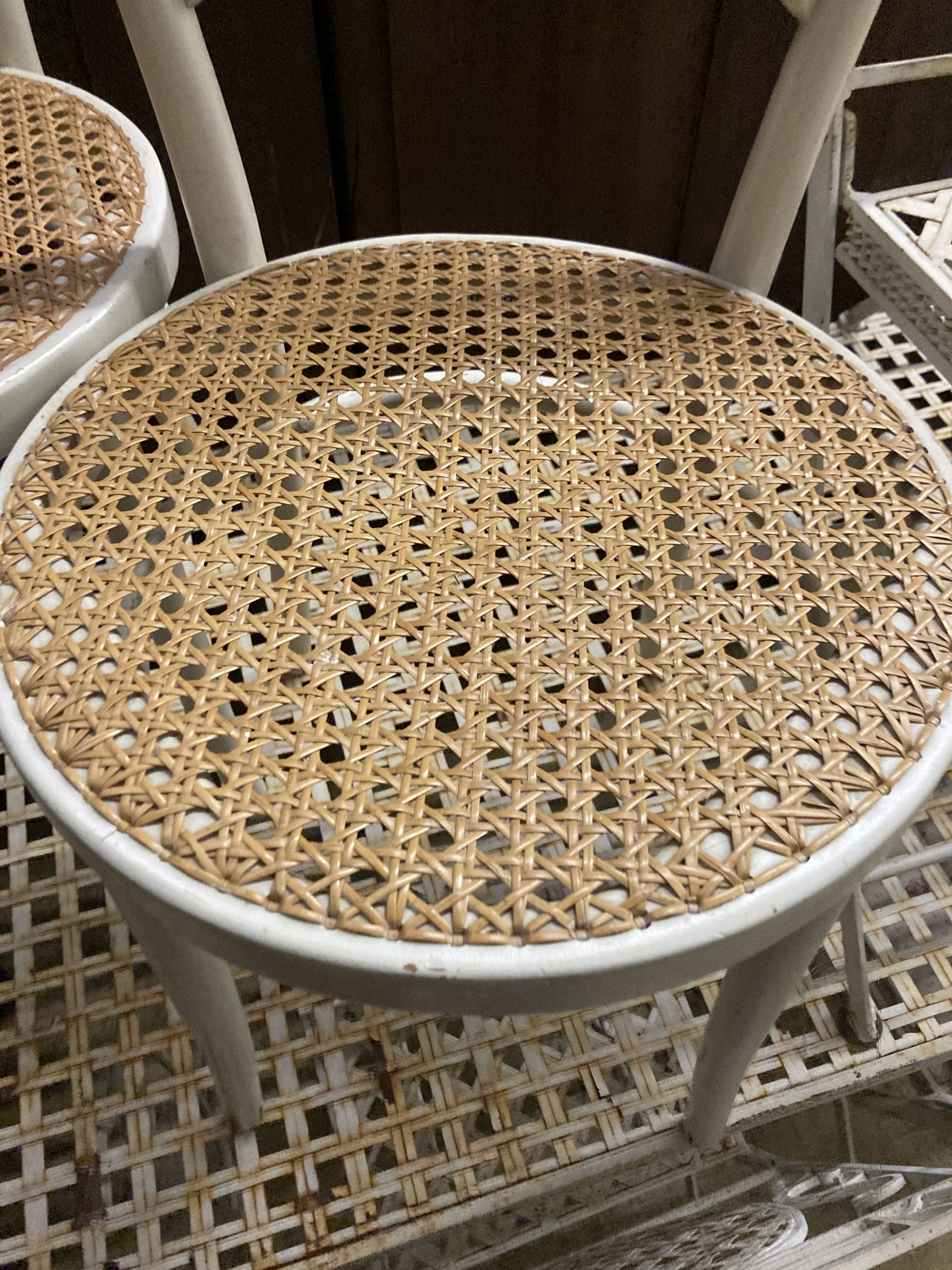 Two Edwardian cane seat chairs and a pair of painted Bentwood cane seat chairs